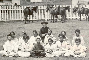 Father Damien with the Kalawao Girls Choir in the 1870s. (Hawaii State Archives)